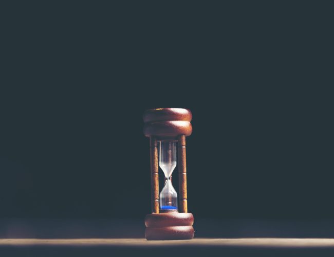 hourglass on black background